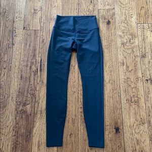 Wunder under dark gray leggings- full length.